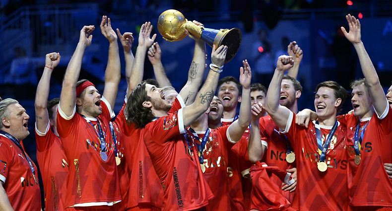Team Denmark celebrates with the trophy during the victory ceremony after winning the Men's IHF World Handball Championship final match between France and Denmark in Stockholm on January 29, 2023. (Photo by Jessica GOW / TT NEWS AGENCY / AFP) / Sweden OUT