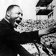 American Civil Rights and religious leader Dr Martin Luther King Jr (1929 - 1968) gestures emphatically during a speech at a Chicago Freedom Movement rally in Soldier Field, Chicago, Illinois, July 10, 1966. (Photo by Afro American Newspapers/Gado/Getty Images)