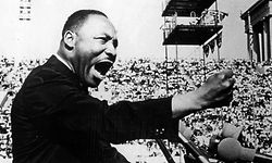 American Civil Rights and religious leader Dr Martin Luther King Jr (1929 - 1968) gestures emphatically during a speech at a Chicago Freedom Movement rally in Soldier Field, Chicago, Illinois, July 10, 1966. (Photo by Afro American Newspapers/Gado/Getty Images)