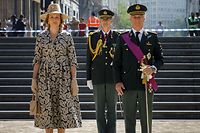 Queen Mathilde of Belgium (L), King Philippe - Filip of Belgium (C) and Belgian Prime Minister Sophie Wilmes (R) attends during a ceremony to commemorate the 75th anniversary of the end of World War II in Europe, at the Tomb of the Unknown Soldier monument in Brussels, on May 8, 2020. (Photo by Olivier MATTHYS / POOL / AFP) / Belgium OUT