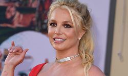 (FILES) In this file photo taken on July 22, 2019 US singer Britney Spears arrives for the premiere of Sony Pictures' "Once Upon a Time... in Hollywood" at the TCL Chinese Theatre in Hollywood, California. - Britney Spears' father is to step down as conservator of her estate, US media reported August 12, 2021, seemingly ending a bitter legal battle with his daughter. Britney, 39, last month launched a bid to remove him from the controversial guardianship role that she said amounted to "abuse." (Photo by VALERIE MACON / AFP)