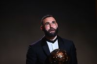 Real Madrid's French forward Karim Benzema receives the Ballon d'Or award during the 2022 Ballon d'Or France Football award ceremony at the Theatre du Chatelet in Paris on October 17, 2022. (Photo by FRANCK FIFE / AFP)