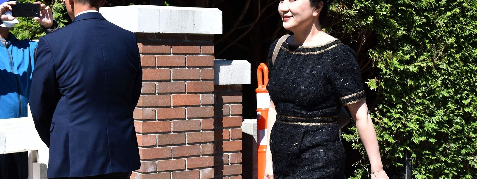 Huawei-Finanzchefin Meng Wanzhou gibt sich am 27. Mai von ihrem Haus in Vancouver aus auf den Weg zum Gericht.