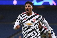 Manchester United's English Forward Marcus Rashford celebrates after scoring a goal  during the UEFA Europa League Group H first-leg football match between Paris Saint-Germain (PSG) and Manchester United at the Parc des Princes stadium in Paris on October 20, 2020. (Photo by FRANCK FIFE / AFP)