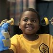 (FILES) This file photo released on July 29, 2015 shows in this undated handout photo provided by the Children's Hospital of Philadelphia in Pennsylvania, 8-year-old Zion Harvey of Baltimore, Maryland posing with his newly transplanted hands.
The first child in the world to undergo a double hand transplant is now able to write, feed and dress himself, doctors said on July 18, 2017, declaring the ground-breaking operation a success after 18 months. / AFP PHOTO / CHOP / Handout