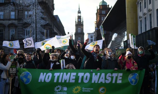 People in Glasgow participate in a protest rally during a global day of action on climate change in November, during the COP26 talks