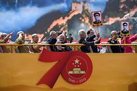 Veterans and relatives of revolutionary martyrs take part in the National Day parade in Tiananmen Square in Beijing on October 1, 2019, to mark the 70th anniversary of the founding of the People�s Republic of China. (Photo by Greg BAKER / AFP)