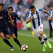 FC Porto's Tiquinho Soares (R) in action against Belenenses Ahman Persson during their Portuguese First League soccer match, held at Dragao stadium, Porto, Portugal, 8 April 2017. JOSE COELHO/LUSA