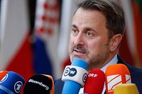 Luxembourg's Prime Minister Xavier Bettel speaks to media as he arrives for the second day of a EU leaders Summit at The European Council Building in Brussels on October 21, 2022. (Photo by Ludovic MARIN / AFP)