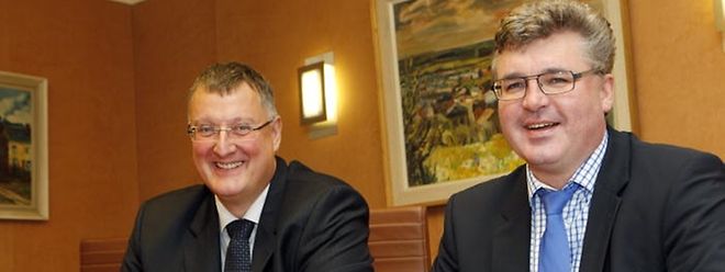 Die Bürgermeister Marco Boly aus der Gemeinde Simmern (l.) und Serge Hoffmann aus der Gemeinde Hobscheid wollen dass die Bürger am 25. Mai 2014 über die geplante Fusion abstimmen.