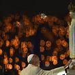 TOPSHOT - Pope Francis touches a figure representing Our Lady of Fatima during the Blessing for the Candles from the Chapel of the Apparitions, in Fatima on May 12, 2017. 
Two of the three child shepherds who reported apparitions of the Virgin Mary in Fatima, Portugal, one century ago, will be declared saints on May 13, 2017 by Pope Francis.
The canonisation of Jacinta and Francisco Marto will take place during the Argentinian pontiff's visit to a Catholic shrine visited by millions of pilgrims every year. / AFP PHOTO / PATRICIA DE MELO MOREIRA