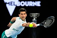 Novak Djokovic of Serbia in action during his Men's singles finals match against Daniil Medvedev of Russia on Day 14 of the Australian Open at Melbourne Park in Melbourne, Sunday, February 21, 2021. (AAP Image/Dave Hunt) NO ARCHIVING, EDITORIAL USE ONLY