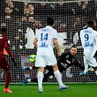 Metz' French Algerian goalkeeper Alexandre Oukidja (2nd R) tries to stop a penalty during the French L1 football match between Metz (FC Metz) and Lyon (OL) at Saint Symphorien stadium in Longeville-l�s-Metz, eastern France, on February 21, 2020. (Photo by JEAN-CHRISTOPHE VERHAEGEN / AFP)