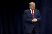 CHICAGO, ILLINOIS - OCTOBER 28: U.S. President Donald Trump arrives for an address to the International Association of Chiefs of Police (IACP) convention on October 28, 2019 in Chicago, Illinois. Trump is expected to attend a fundraiser hosted by Chicago Cubs co-owner and Trump Victory Committee Finance Chairman Todd Ricketts at Trump Tower following the address. The visit is Trump's first official visit to the city since protesters forced him to cancel a 2016 campaign rally in the city.   Scott Olson/Getty Images/AFP
== FOR NEWSPAPERS, INTERNET, TELCOS & TELEVISION USE ONLY ==