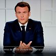 French President Emmanuel Macron is seen on a TV screen as he speaks during a televised address, broadcasted by French TV channel France 2, on the new Covid-19 restrictions from the Elysee Palace in Paris on March 31, 2021. (Photo by Ludovic MARIN / AFP)
