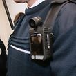 A police officer wears a body-worn camera ('camera pieton' in French) during the inauguration of the new police station of Les Mureaux on April 8, 2016. / AFP PHOTO / JACQUES DEMARTHONJACQUES DEMARTHON/AFP/Getty Images