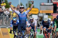 Quick-Step Alpha Vinyl Team's Dutch rider Fabio Jakobsen celebrates as he crosses the finish line to win the 2nd stage of the 109th edition of the Tour de France cycling race, 202,2 km between Roskilde and Nyborg, in Denmark, on July 2, 2022. (Photo by Tim K. Jensen / Ritzau Scanpix / AFP) / Denmark OUT