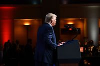 US President Donald Trump speaks as delegates gather during the first day of the Republican National Convention on August 24, 2020, in Charlotte, North Carolina. - President Donald Trump went into battle for a second term Monday with his nomination at a Republican convention where he will draw on all his showman's instincts to try and change the narrative in an election he is currently set to lose. (Photo by Brendan Smialowski / AFP)
