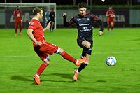 Dominik Stolz, rouge, Swift Hesperange, and Mohammed Naifi, FC Differdange 03. Football: Swift Hesperange – FC Differdange 03, BGL Ligue.  Stade Alphonse Theis, Hesperange.  Photo: Stéphane Guillaume