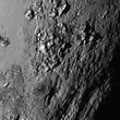 A new close-up image of a region near Pluto�s equator reveals a range of youthful mountains rising as high as 11,000 feet (3,500 meters) above the surface of the icy body, in a picture released by NASA in Laurel, Maryland July 15, 2015.  A U.S. spacecraft sailed past the tiny planet Pluto in the distant reaches of the solar system on Tuesday, capping a journey of 3 billion miles (4.88 billion km) that began nine and a half years ago. NASA's New Horizons spacecraft passed by the ice-and-rock planetoid and its entourage of five moons at 7:49 a.m. EDT (1149 GMT). The event culminated an initiative to survey the solar system that the space agency embarked upon more than 50 years ago.  REUTERS/NASA New Horizons/Handout via Reuters   TPX IMAGES OF THE DAY. THIS IMAGE HAS BEEN SUPPLIED BY A THIRD PARTY. IT IS DISTRIBUTED, EXACTLY AS RECEIVED BY REUTERS, AS A SERVICE TO CLIENTS. FOR EDITORIAL USE ONLY. NOT FOR SALE FOR MARKETING OR ADVERTISING CAMPAIGNS