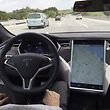 The interior of a Tesla Model S is shown in autopilot mode in San Francisco, California, U.S., April 7, 2016.   REUTERS/Alexandria Sage/File Photo