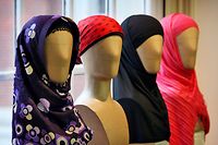 Burqas are displayed at the headscarf exhibition in the Amsterdam Historical Museum February 28, 2006. In December 2005, parliament voted to forbid women from wearing a burqa or any Muslim face coverings in public, justifying the move in part as a security measure. The cabinet is awaiting the results of a study into the legality of such a ban under European human rights laws, before making its final decision. The results are expected in the second half of March 2006. Photograph taken February 28, 2006. To match feature Religion-Dutch-Burqa  REUTERS/Paul Vreeker
