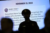 WASHINGTON, DC - NOVEMBER 15: A tweet from U.S. President Donald Trump created while former U.S. Ambassador to Ukraine Marie Yovanovitch's testifies before the House Intelligence Committee is shown in the Longworth House Office Building on Capitol Hill November 15, 2019 in Washington, DC. In the second impeachment hearing held by the committee, House Democrats continue to build a case against U.S. President Donald Trumps efforts to link U.S. military aid for Ukraine to the nations investigation of his political rivals.   Drew Angerer/Getty Images/AFP
== FOR NEWSPAPERS, INTERNET, TELCOS & TELEVISION USE ONLY ==