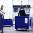 An employee of Cryonomic, a Belgium's company producing dry ice machines and containers which will be used for Covid-19 vaccines transportation, pushes a medical dry ice container in Ghent on December 2, 2020. (Photo by Kenzo TRIBOUILLARD / AFP)