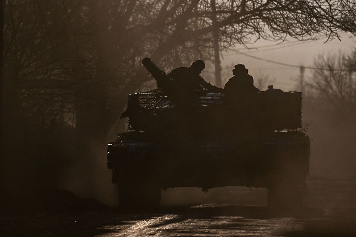 Ukrainian servicemen with a T64 tanks move towards Bakhmut direction, in Donetsk Oblast region, on 20 March, 2023