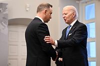 US President Joe Biden (R) is welcomed by Polish President Andrzej Duda at the Presidential Palace in Warsaw on February 22, 2023 for a Bucharest Nine (B9) meeting. (Photo by Mandel NGAN / AFP)
