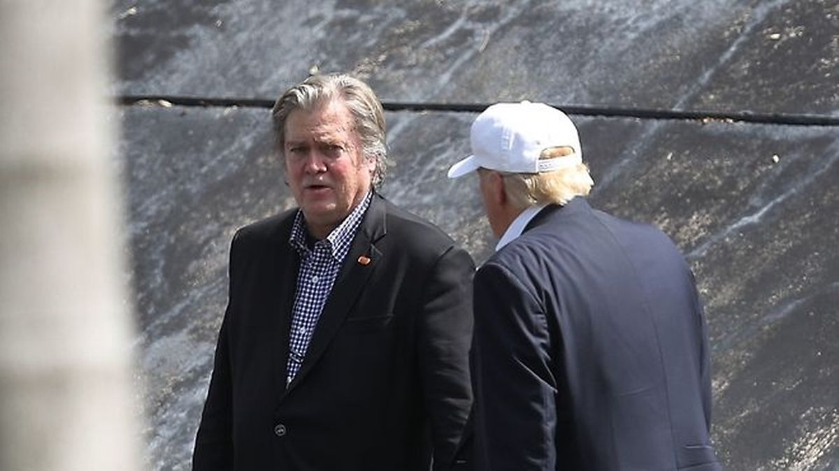 Steve Bannon, former CEO of Donald Trump's presidential campaign, and Trump after a campaign rally at the Bayfront Park Amphitheater in Miami, Florida (AFP)