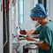 A members of the medical staff fills in a Covid-19 patient register at the Pasteur hospital resuscitation unit in Colmar, eastern France, on April 22, 2021. (Photo by SEBASTIEN BOZON / AFP)