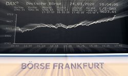 A display showing the German share index Stock Market Index DAX is pictured at the stock exchange in Frankfurt, Germany, on March 24, 2019. - The German Stock Exchange in Frankfurt rebounded strongly on March 24, with the Dax gaining 10.98% at closing in a market reacting to the extent of monetary support from central banks and state budgets, in the fight against the economic damage caused by the COV-19 coronavirus pandemic. (Photo by Daniel ROLAND / AFP)