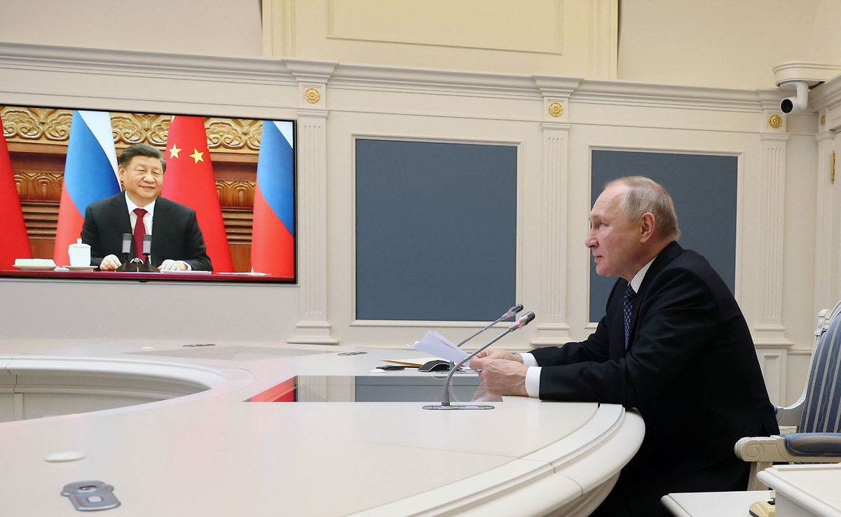 Russian President Vladimir Putin holds a meeting with Chinese President Xi Jinping via a video link at the Kremlin in Moscow on 30 December, 2022