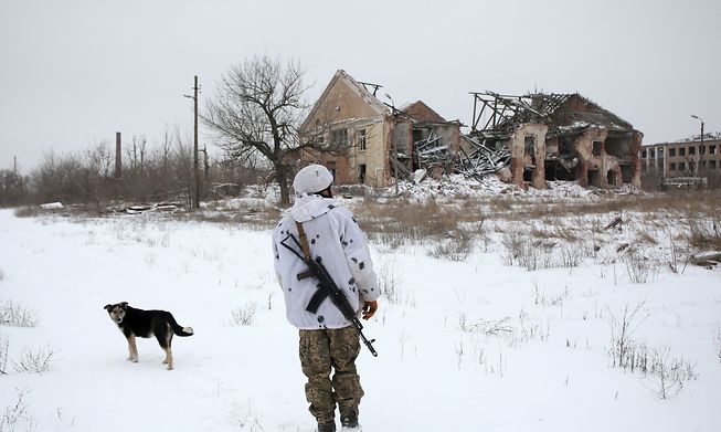 A Ukrainian Military Forces serviceman in eastern Ukraine close to the front-line with Russia-backed separatists