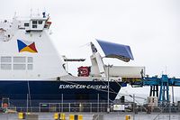 ARCHIVE - 31.12.2020, Great Britain, Belfast: A lorry is transported on a ferry in the port of Larne.  The police will hold talks with partner authorities in the course of the day after the physical Brexit controls in the ports of Belfast and Larne were suspended due to security concerns Photo: Liam Mcburney / PA Wire / dpa +++ dpa-Bildfunk +++