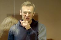 HANDOUT - 16.02.2021, Russland, Moskau: Der russische Oppositionsaktivist Alexej Nawalny erscheint zu einer Anhörung im Fall von Navalnys Diffamierung des Kriegsveteranen Artyomenko im Moskauer Bezirksgericht Babushkinsky. Begleitet von massiven Sicherheitsvorkehrungen ist in Russland der Prozess gegen den Kremlgegner Nawalny wegen Diffamierung eines Kriegsveteranen fortgesetzt worden. Foto: Press Office Of Moscow's Babushk/TASS/dpa - ACHTUNG: Nur zur redaktionellen Verwendung und nur mit vollständiger Nennung des vorstehenden Credits +++ dpa-Bildfunk +++