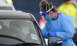 CORRECTION / Health workers conduct COVID-19 tests at the St. Vincent�s Hospital drive-through testing clinic at Bondi Beach in Sydney June 27, 2021, on the first full day of a two-week coronavirus lockdown to contain an outbreak of the highly contagious Delta variant. (Photo by Steven Saphore / AFP) / �The erroneous mention[s] appearing in the metadata of this photo by Steven Saphore has been modified in AFP systems in the following manner: [June 27] instead of [June 26]. Please immediately remove the erroneous mention[s] from all your online services and delete it (them) from your servers. If you have been authorized by AFP to distribute it (them) to third parties, please ensure that the same actions are carried out by them. Failure to promptly comply with these instructions will entail liability on your part for any continued or post notification usage. Therefore we thank you very much for all your attention and prompt action. We are sorry for the inconvenience this notification may cause and remain at your disposal for any further information you may require.�