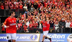 Denmark's Henrik Toft Hansen (R) celebrates after scoring during the IHF Men's World Championship 2019 Group II main round handball match between Denmark and Sweden at the Jyske Bank Boxen arena in Herning on January 23, 2019. (Photo by Jonathan NACKSTRAND / AFP)