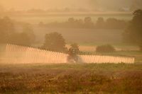 (FILES) In this file photo taken on September 16, 2019, a French farmer sprays glyphosate herbicide "Roundup 720" made by agrochemical giant Monsanto, at the rate of 720 grams per hectare, in Saint Germain-Sur- Sarthe, northwestern France, in a field of rye, peas, faba beans, triticals and Bird's-foot trefoil, sown in no-till vegetal cover, at sunrise. (Photo by JEAN-FRANCOIS MONIER / AFP)