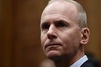 (FILES) In this file photo taken on October 30, 2019 Boeing CEO Dennis Muilenburg testifies at a hearing in front of congressional lawmakers on Capitol Hill in Washington, DC. - President Donald Trump phoned the head of Boeing ahead of the company's announcement Monday that it was halting production of the 737 MAX, a person familiar with the matter said on December 19, 2019. Trump called Boeing Chief Executive Dennis Muilenburg on December 15, 2019 for details about the MAX production plans, the person said, confirming reports in US media. (Photo by Olivier Douliery / AFP)