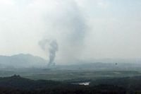 Smoke rise from North Korea's Kaesong Industrial Complex where an inter-korean liaison office was set up in 2018, as seen from South Korea's border city of Paju on June 16, 2020. - North Korea blew up an inter-Korean liaison office on its side of the border on June 16, the South's Unification ministry said, after days of increasingly virulent rhetoric from Pyongyang. (Photo by STR / YONHAP / AFP) / - South Korea OUT / REPUBLIC OF KOREA OUT  NO ARCHIVES  RESTRICTED TO SUBSCRIPTION USE