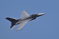 A US Air Force's (USAF) F-16 Fighting Falcon fighter jet flies past during the second day of the 14th edition of Aero India 2023 at the Yelahanka Air Force Station in Bengaluru on February 14, 2023. (Photo by Manjunath KIRAN / AFP)