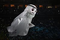 TOPSHOT - The Qatar 2022 mascot La'eeb performs during the opening ceremony ahead of the Qatar 2022 World Cup Group A football match between Qatar and Ecuador at the Al-Bayt Stadium in Al Khor, north of Doha on November 20, 2022. (Photo by MANAN VATSYAYANA / AFP)