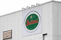 The logo of the Buitoni factory adorns the side of the factory in Caudry, northern France on April 1, 2022. - Swiss food giant Nestle said on March 31, 2022, that tests carried out at its Caudry site, which produces Buitoni pizzas, some of which have been contaminated with E. coli, turned out to be negative. French health authorities confirmed on March 30, 3022, that some cases of Escherichia coli contamination were linked to the consumption of Fraich'Up pizzas, the entire range of which Nestl� recalled on March 18. (Photo by FRANCOIS LO PRESTI / AFP)