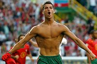 Cristiano Ronaldo celebrating a goal against the Netherlands.  EPA/OLIVER BERG