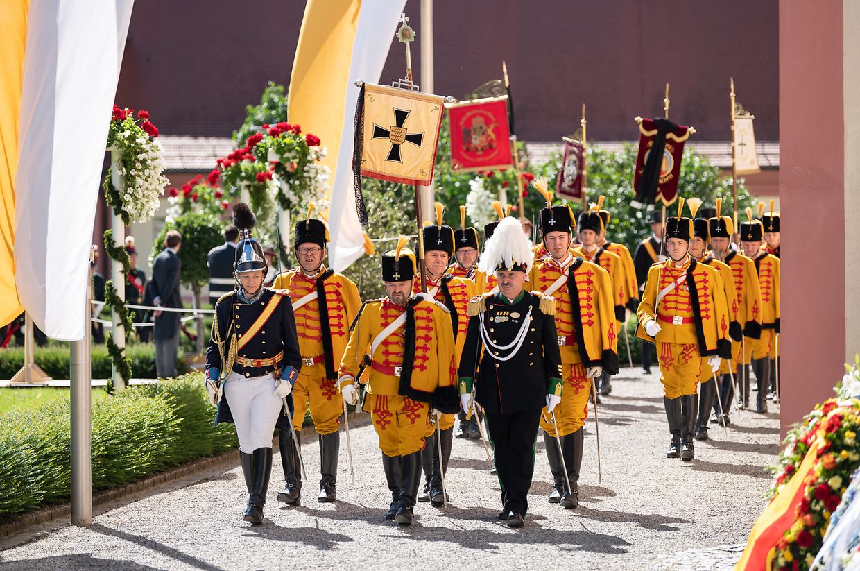 The Yellow Hussars walk before the start of the funeral service for Carl Duke of Württemberg. 