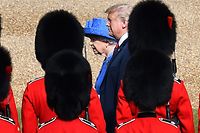 Britain's Queen Elizabeth II (L) and US President Donald Trump (R) inspect the guard of honour formed of the Coldstream Guards during a welcome ceremony at Windsor Castle in Windsor, west of London, on July 13, 2018 on the second day of Trump's UK visit.
US President Donald Trump launched an extraordinary attack on Prime Minister Theresa May's Brexit strategy, plunging the transatlantic "special relationship" to a new low as they prepared to meet Friday on the second day of his tumultuous trip to Britain. / AFP PHOTO / POOL / Ben STANSALL