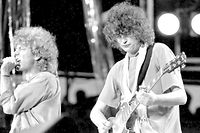 **  FILE  ** Singer Robert Plant, left, and guitarist Jimmy Page, right, of the British rock band Led Zeppelin perform at the Live Aid concert at Philadelphia's J.F.K. Stadium in this file photo July 13, 1985. Led Zeppelin announced Wednesday, Sept. 12, 2007, a one-off comeback concert in tribute to the late founder of Atlantic Records, Ahmet Ertegun, who signed the band in 1968. The group's three original members, singer Robert Plant, guitarist Jimmy Page and bassist John Paul Jones, will headline the November concert at The O2 arena in London with late drummer John Bonham's son, Jason, on drums. (AP Photo/Rusty Kennedy)