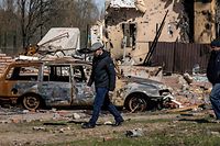 Cenário de destruição na cidade de Bohdanivka, a nordeste de Kiev, após os ataques russos.
